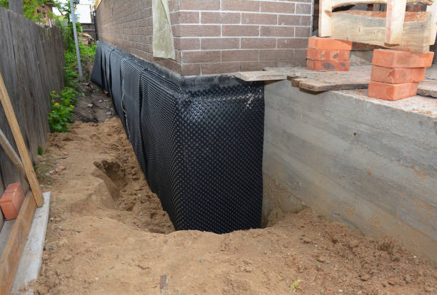 Happy homeowners after waterproofing job in North Bergen
